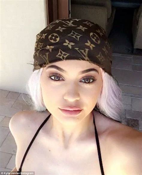 Kylie Jenner dons Louis Vuitton monokini and head scarf in 